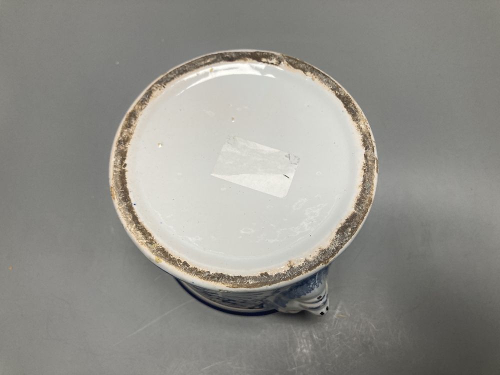 An 18th/19th century Delft blue and white jar and cover, with bearded mask handles, 17cm